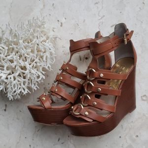 Michael course wedge heels
